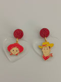 Pendientes Personajes juguetes y corazones transparentes