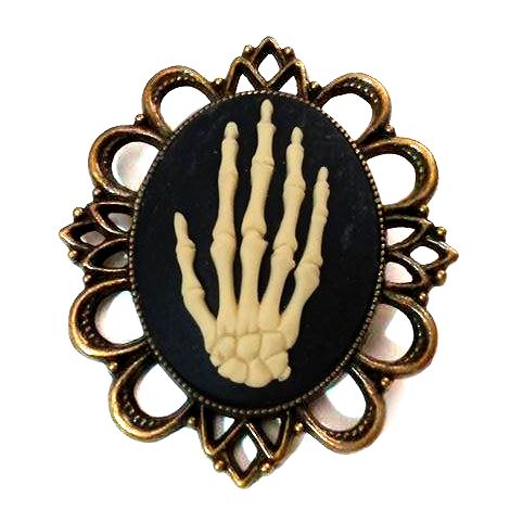 Skeleton hand cameo brooch